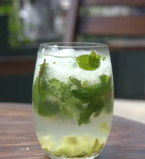 A house mint cooler served over ice at CinderMint
