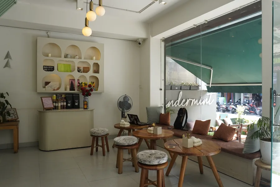The mint-and-cream seating area inside CinderMint, Lakeside Pokhara
